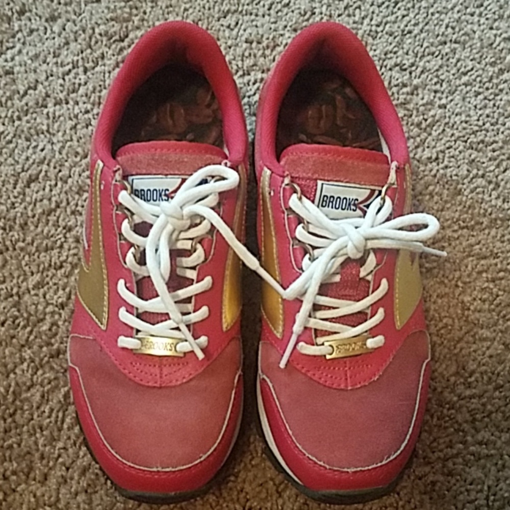Brooks pink and gold sneakers
